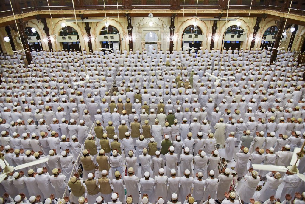 Mumineen gathered for namaaz inside a Dawoodi Bohra masjid